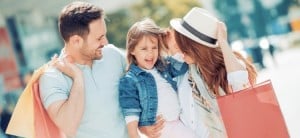 Young family enjoying shopping
